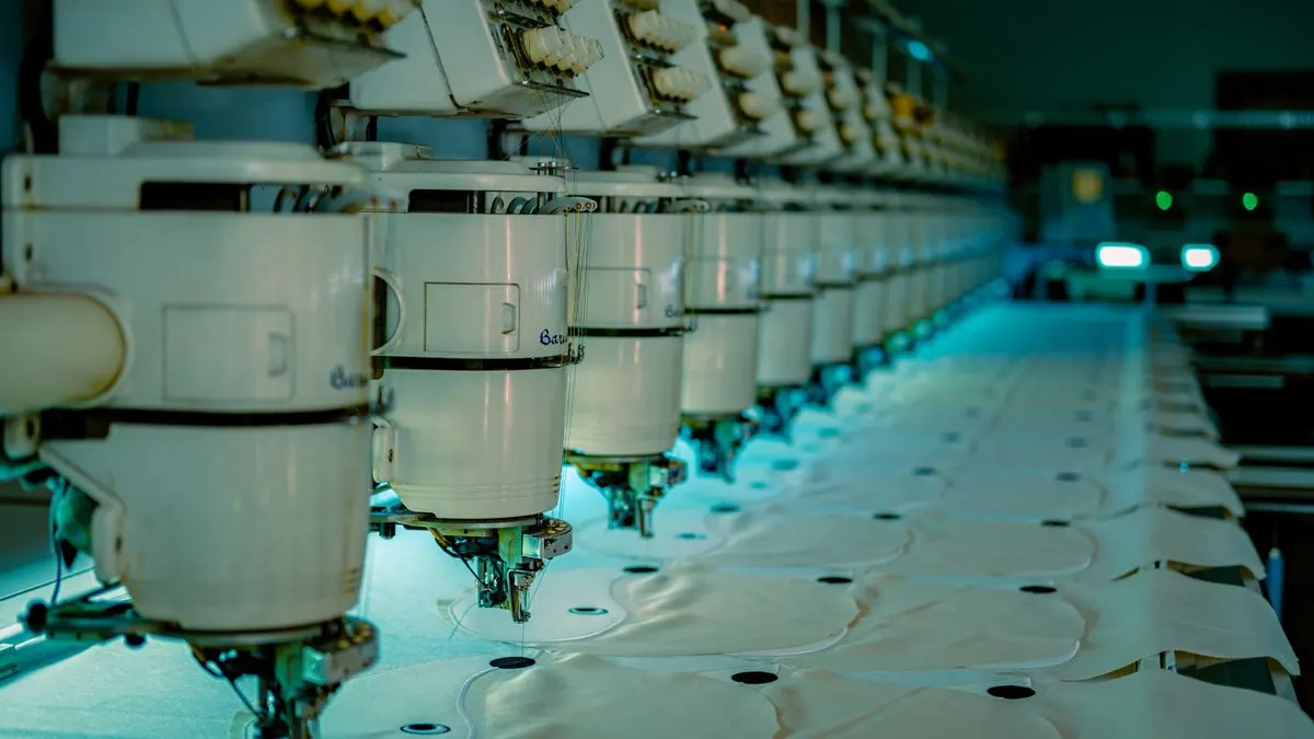 Cuts fabric and assembles finished apparel at volume.