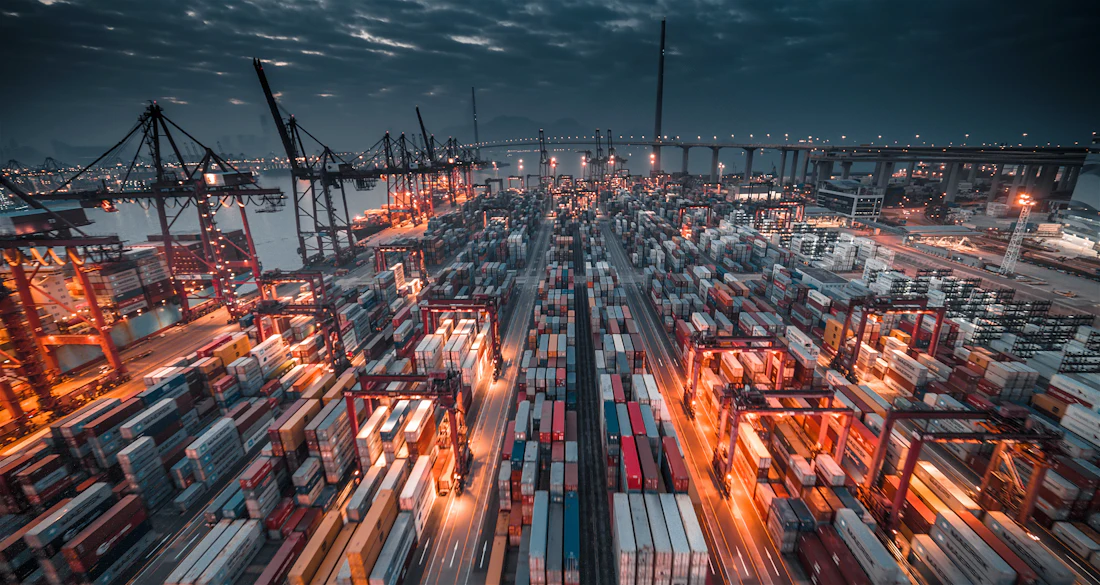 Shipping containers stacked at a port terminal